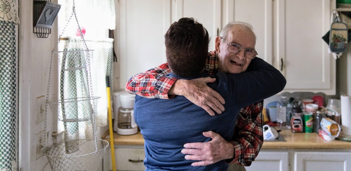 elderly-gentleman-woman-hugging