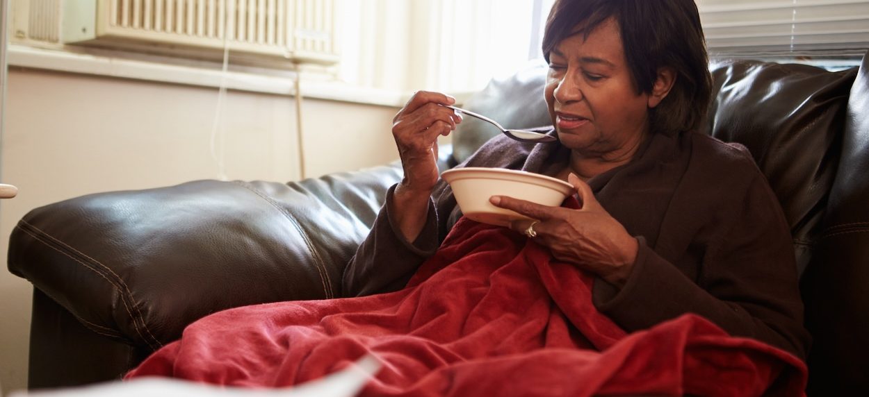 senior-woman-poor-diet-under-blanket